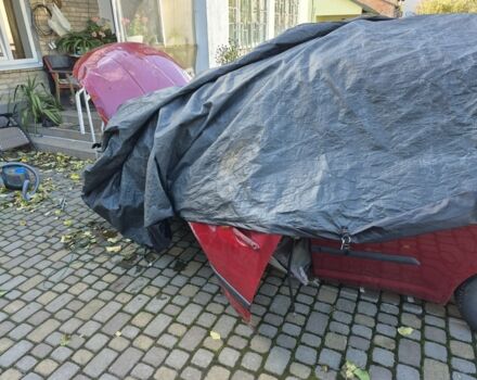 Красный Ниссан Тиида, объемом двигателя 1.6 л и пробегом 94 тыс. км за 3500 $, фото 5 на Automoto.ua