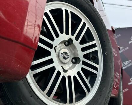 Красный Ниссан Тиида, объемом двигателя 1.6 л и пробегом 155 тыс. км за 6800 $, фото 5 на Automoto.ua