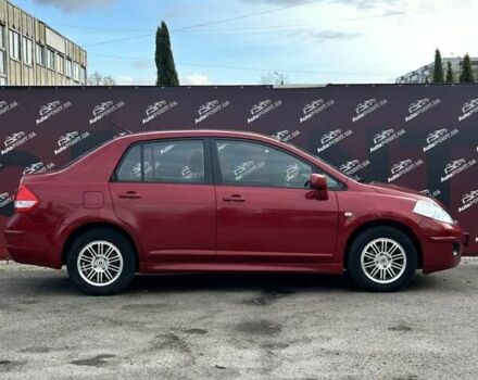 Красный Ниссан Тиида, объемом двигателя 1.6 л и пробегом 155 тыс. км за 6800 $, фото 3 на Automoto.ua