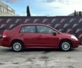 Красный Ниссан Тиида, объемом двигателя 1.6 л и пробегом 155 тыс. км за 6800 $, фото 3 на Automoto.ua