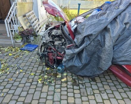 Красный Ниссан Тиида, объемом двигателя 1.6 л и пробегом 94 тыс. км за 3500 $, фото 6 на Automoto.ua