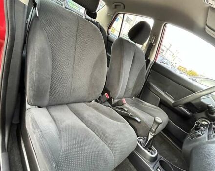 Красный Ниссан Тиида, объемом двигателя 1.6 л и пробегом 155 тыс. км за 6800 $, фото 27 на Automoto.ua