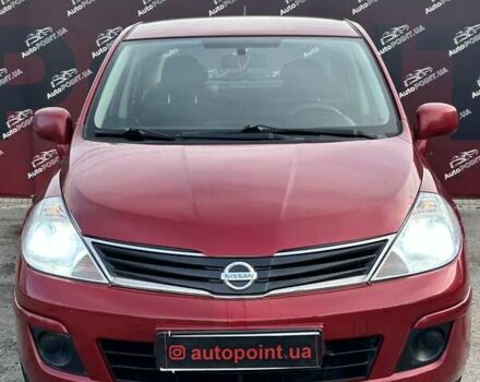 Красный Ниссан Тиида, объемом двигателя 1.6 л и пробегом 155 тыс. км за 6800 $, фото 1 на Automoto.ua