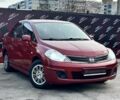 Красный Ниссан Тиида, объемом двигателя 1.6 л и пробегом 155 тыс. км за 6800 $, фото 1 на Automoto.ua