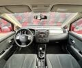 Красный Ниссан Тиида, объемом двигателя 1.6 л и пробегом 155 тыс. км за 6800 $, фото 14 на Automoto.ua