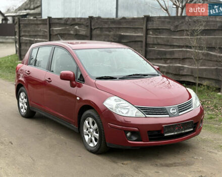 Красный Ниссан Тиида, объемом двигателя 1.6 л и пробегом 145 тыс. км за 6350 $, фото 1 на Automoto.ua