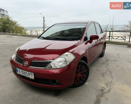 Красный Ниссан Тиида, объемом двигателя 1.6 л и пробегом 227 тыс. км за 5900 $, фото 1 на Automoto.ua