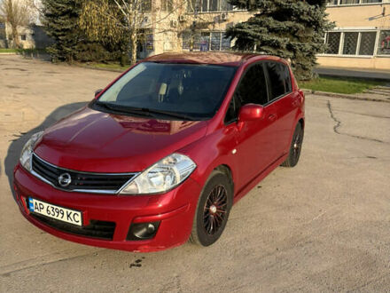 Ніссан Тііда 2010 у Запоріжжя на Automoto.ua Червоний Ніссан Тііда, об'ємом двигуна 1.6 л та пробігом 118 тис. км за 6800 $, фото 1 на Automoto.ua