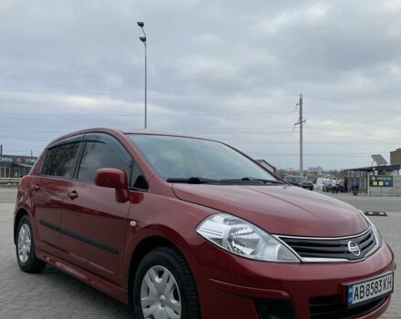 Красный Ниссан Тиида, объемом двигателя 1.6 л и пробегом 59 тыс. км за 9900 $, фото 1 на Automoto.ua