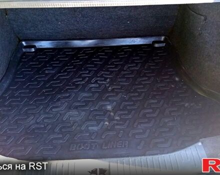 Жовтий Ніссан Тііда, об'ємом двигуна 1.6 л та пробігом 202 тис. км за 4750 $, фото 5 на Automoto.ua
