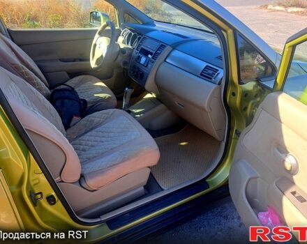 Желтый Ниссан Тиида, объемом двигателя 1.6 л и пробегом 192 тыс. км за 5300 $, фото 6 на Automoto.ua
