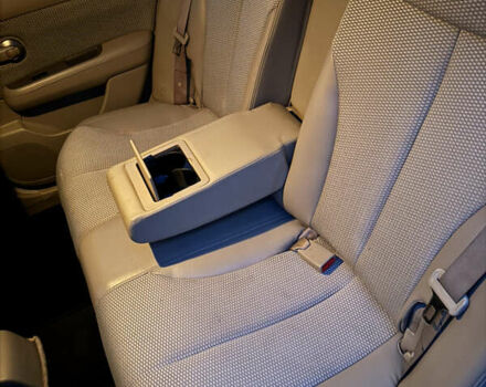 Желтый Ниссан Тиида, объемом двигателя 1.6 л и пробегом 171 тыс. км за 5799 $, фото 9 на Automoto.ua