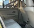 Жовтий Ніссан Тііда, об'ємом двигуна 1.6 л та пробігом 164 тис. км за 5999 $, фото 25 на Automoto.ua