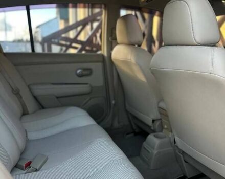 Жовтий Ніссан Тііда, об'ємом двигуна 1.6 л та пробігом 164 тис. км за 5999 $, фото 26 на Automoto.ua