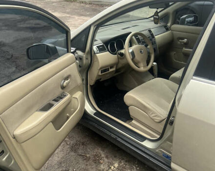 Желтый Ниссан Тиида, объемом двигателя 1.6 л и пробегом 204 тыс. км за 4300 $, фото 4 на Automoto.ua