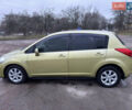 Желтый Ниссан Тиида, объемом двигателя 1.6 л и пробегом 171 тыс. км за 5799 $, фото 4 на Automoto.ua