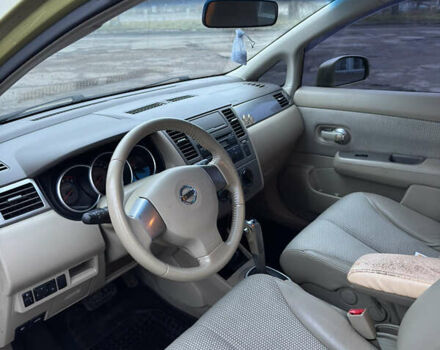 Желтый Ниссан Тиида, объемом двигателя 1.6 л и пробегом 171 тыс. км за 5799 $, фото 7 на Automoto.ua