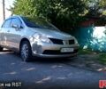 Жовтий Ніссан Тііда, об'ємом двигуна 1.6 л та пробігом 202 тис. км за 4750 $, фото 1 на Automoto.ua