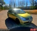 Желтый Ниссан Тиида, объемом двигателя 1.6 л и пробегом 192 тыс. км за 5300 $, фото 1 на Automoto.ua