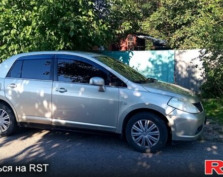 Жовтий Ніссан Тііда, об'ємом двигуна 1.6 л та пробігом 202 тис. км за 4750 $, фото 1 на Automoto.ua