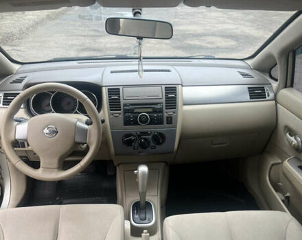 Желтый Ниссан Тиида, объемом двигателя 1.6 л и пробегом 204 тыс. км за 4300 $, фото 5 на Automoto.ua