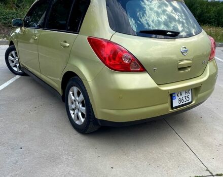 Желтый Ниссан Тиида, объемом двигателя 1.6 л и пробегом 155 тыс. км за 4799 $, фото 3 на Automoto.ua
