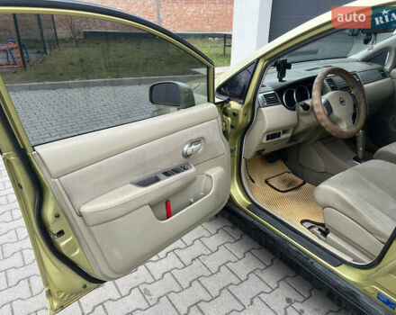 Желтый Ниссан Тиида, объемом двигателя 1.6 л и пробегом 216 тыс. км за 5999 $, фото 23 на Automoto.ua