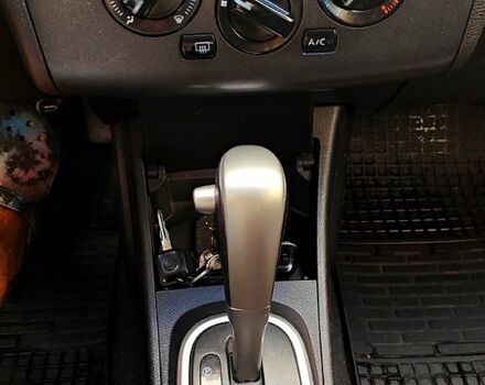 Желтый Ниссан Тиида, объемом двигателя 1.6 л и пробегом 155 тыс. км за 4799 $, фото 11 на Automoto.ua