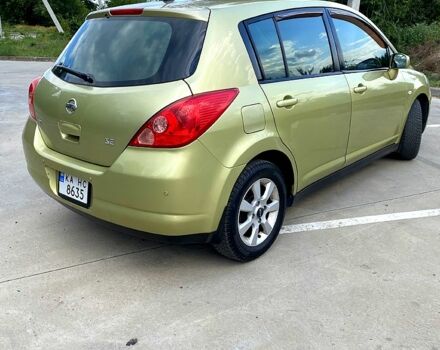 Желтый Ниссан Тиида, объемом двигателя 1.6 л и пробегом 155 тыс. км за 4799 $, фото 2 на Automoto.ua