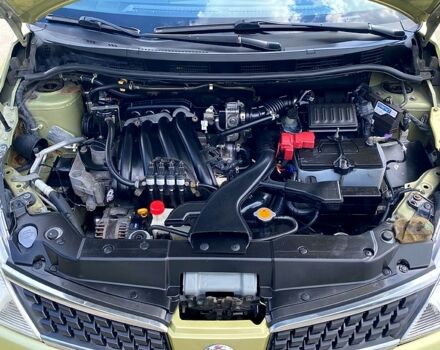 Желтый Ниссан Тиида, объемом двигателя 1.6 л и пробегом 155 тыс. км за 4799 $, фото 8 на Automoto.ua