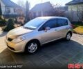 Желтый Ниссан Тиида, объемом двигателя 1.6 л и пробегом 192 тыс. км за 6100 $, фото 2 на Automoto.ua