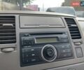Желтый Ниссан Тиида, объемом двигателя 1.6 л и пробегом 100 тыс. км за 6990 $, фото 17 на Automoto.ua