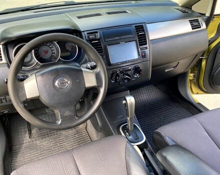 Желтый Ниссан Тиида, объемом двигателя 1.6 л и пробегом 155 тыс. км за 4799 $, фото 10 на Automoto.ua