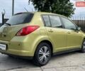Желтый Ниссан Тиида, объемом двигателя 1.6 л и пробегом 100 тыс. км за 6990 $, фото 4 на Automoto.ua