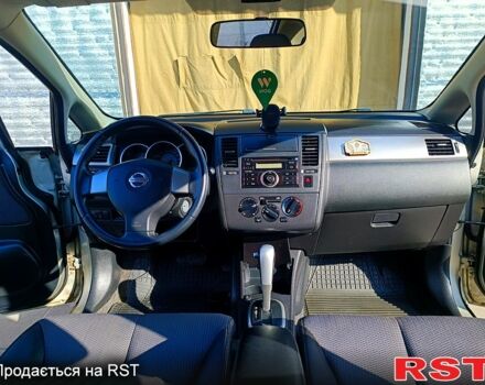 Желтый Ниссан Тиида, объемом двигателя 1.6 л и пробегом 192 тыс. км за 6100 $, фото 7 на Automoto.ua
