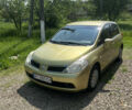 Жовтий Ніссан Тііда, об'ємом двигуна 1.6 л та пробігом 200 тис. км за 6150 $, фото 2 на Automoto.ua
