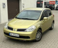 Желтый Ниссан Тиида, объемом двигателя 1.6 л и пробегом 216 тыс. км за 5999 $, фото 1 на Automoto.ua