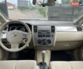 Желтый Ниссан Тиида, объемом двигателя 1.6 л и пробегом 100 тыс. км за 6990 $, фото 12 на Automoto.ua
