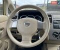 Желтый Ниссан Тиида, объемом двигателя 1.6 л и пробегом 100 тыс. км за 6990 $, фото 13 на Automoto.ua