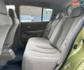 Желтый Ниссан Тиида, объемом двигателя 1.6 л и пробегом 100 тыс. км за 6990 $, фото 9 на Automoto.ua