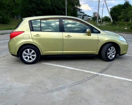 Желтый Ниссан Тиида, объемом двигателя 1.6 л и пробегом 155 тыс. км за 4799 $, фото 5 на Automoto.ua