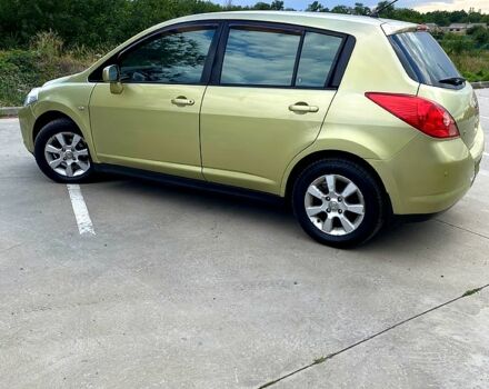 Желтый Ниссан Тиида, объемом двигателя 1.6 л и пробегом 155 тыс. км за 4799 $, фото 4 на Automoto.ua