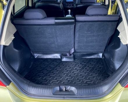 Желтый Ниссан Тиида, объемом двигателя 1.6 л и пробегом 155 тыс. км за 4799 $, фото 9 на Automoto.ua