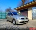 Желтый Ниссан Тиида, объемом двигателя 1.6 л и пробегом 192 тыс. км за 6100 $, фото 5 на Automoto.ua