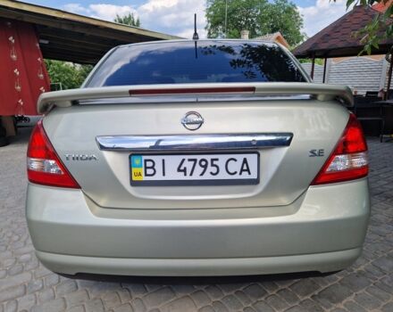 Жовтий Ніссан Тііда, об'ємом двигуна 1.6 л та пробігом 255 тис. км за 4999 $, фото 3 на Automoto.ua
