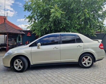 Жовтий Ніссан Тііда, об'ємом двигуна 1.6 л та пробігом 255 тис. км за 4999 $, фото 1 на Automoto.ua
