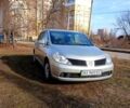 Жовтий Ніссан Тііда, об'ємом двигуна 1.6 л та пробігом 200 тис. км за 5000 $, фото 1 на Automoto.ua