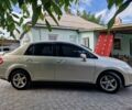 Жовтий Ніссан Тііда, об'ємом двигуна 1.6 л та пробігом 255 тис. км за 4999 $, фото 5 на Automoto.ua
