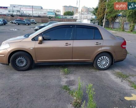 Желтый Ниссан Тиида, объемом двигателя 1.6 л и пробегом 325 тыс. км за 5350 $, фото 1 на Automoto.ua