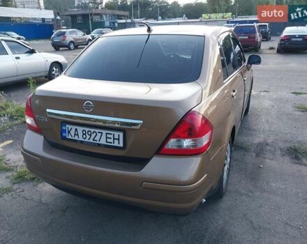 Желтый Ниссан Тиида, объемом двигателя 1.6 л и пробегом 325 тыс. км за 5350 $, фото 3 на Automoto.ua